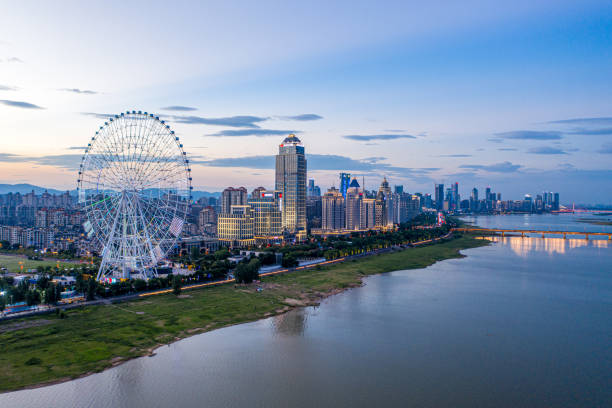 istock China city night skyline, river and buildings 1330931788