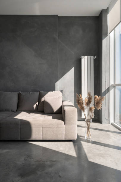 istock Sunlight in room with new comfort couch 1330932038