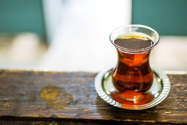 breakfast turkish tea - two objects cup saucer isolated imagens e fotografias de stock