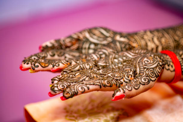 istock Hindu bride's hand painted with mehndi 1330935515