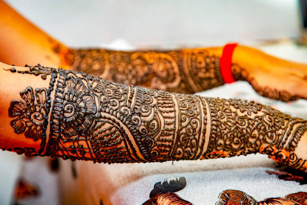 istock Hindu bride's hand painted with mehndi 1330935518