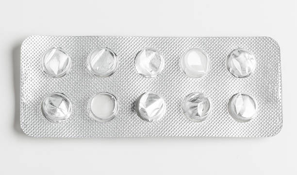 istock Silver blister packs pills isolated on white 1330936666