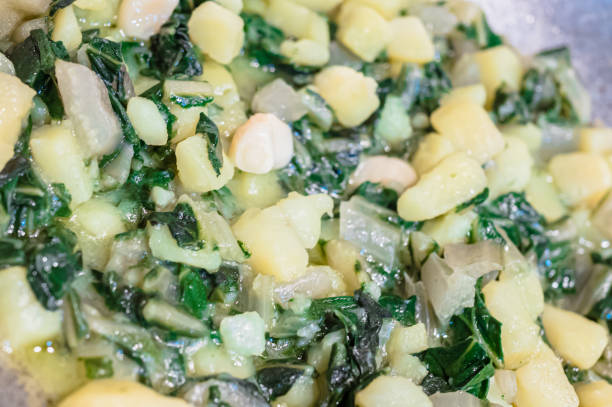 close-up of the typical seasoning used in the recipe for making pizzoccheri. typical dish from valtellina, lombardy, italy. - pizzoccheri homemade tagliatelle italy imagens e fotografias de stock