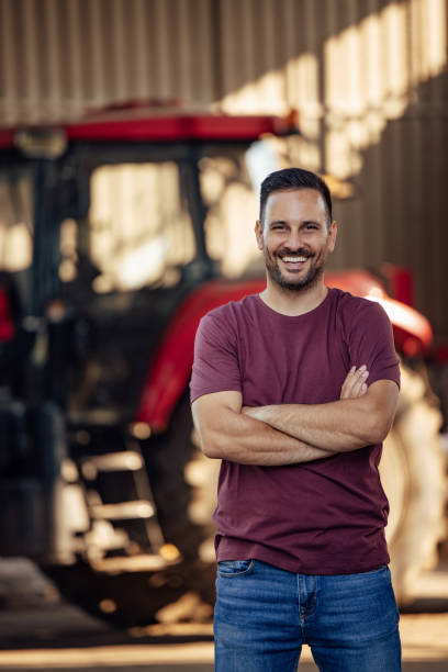 istock Adult man, getting ready to drive a tractor. 1330939661