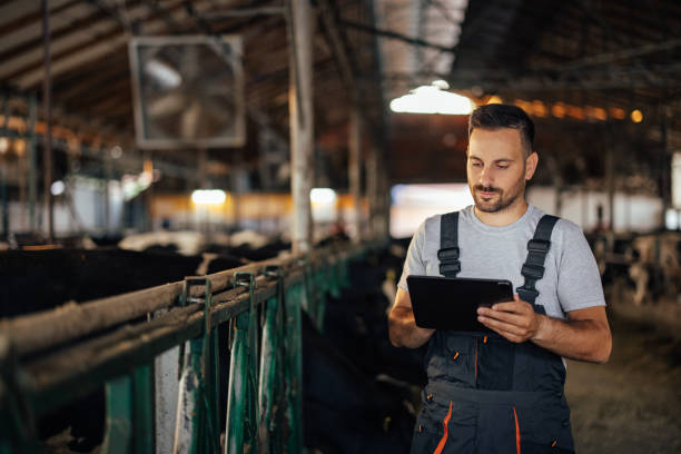 istock Adult man, holding a tablet, while walking. 1330939713