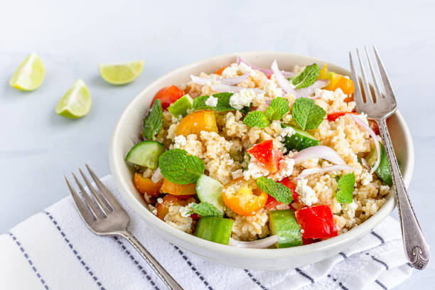 istock Bulgur Wheat Salad with Vegetables in a Bowl 1330940125