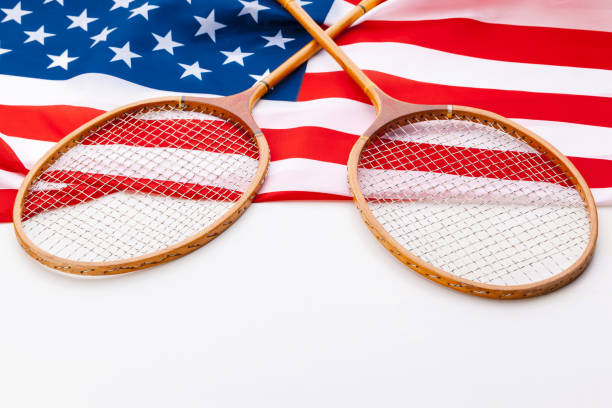 istock American flag with tennis rackets. 1330941094