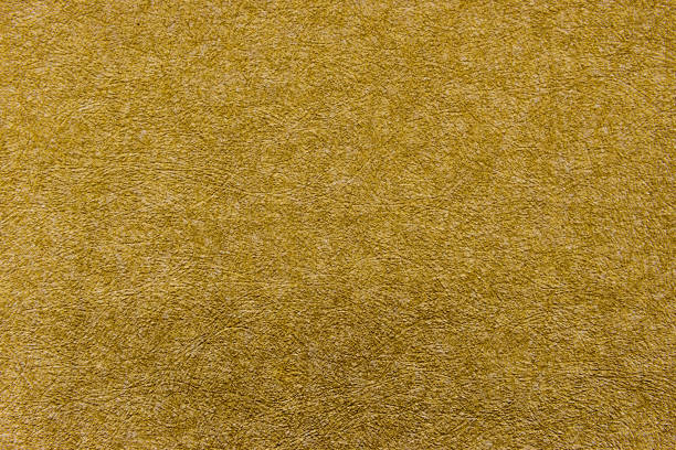 istock gold textured wallpaper art for interiors design work 1330942578