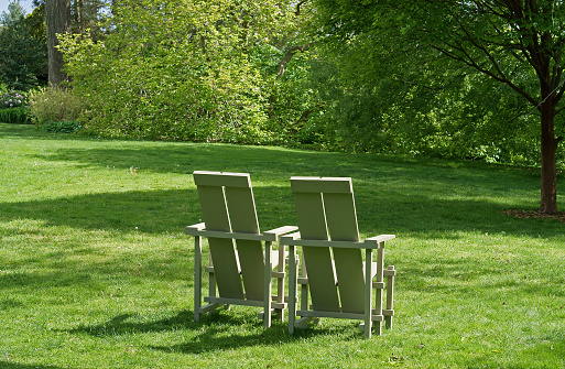 Wooden chairs in Wave Hill in Hudson Hill of Riverdale in Bronx, New York City