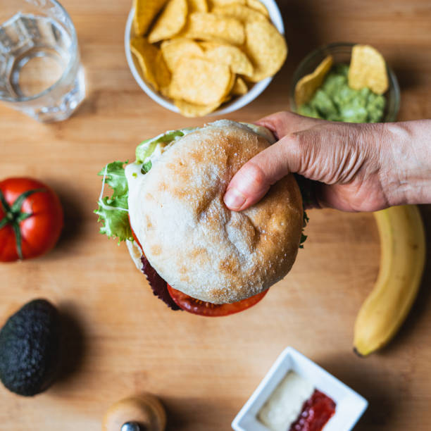 istock Fresh tasty burger with rustic bun. Healthy food. 1330947812