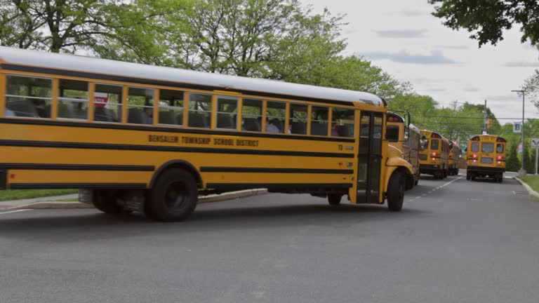 Yellow school bus for children educational transport on the street