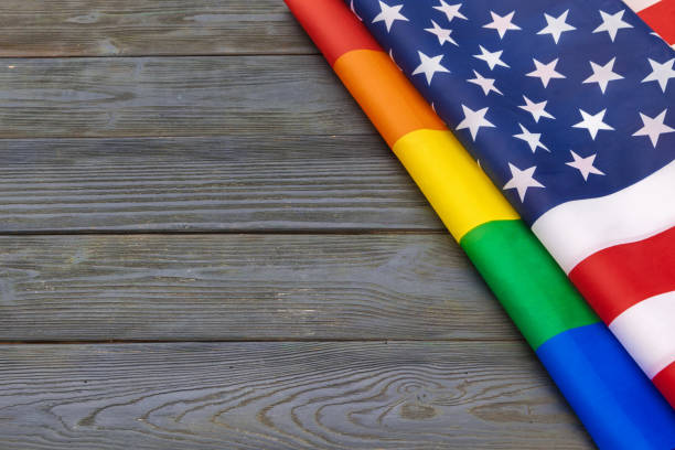 istock Rainbow flag of Pride and USA flag 1330949017