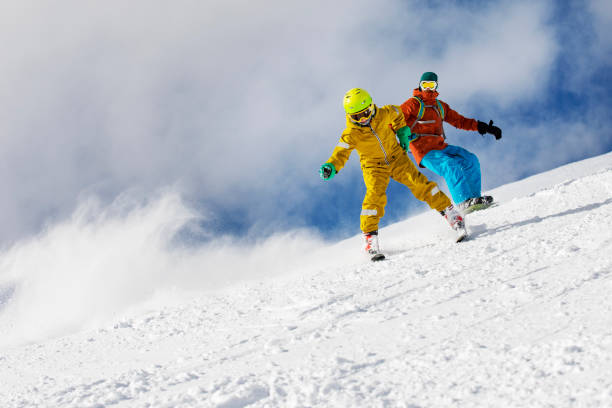 istock Father and son skiing together 1330949120