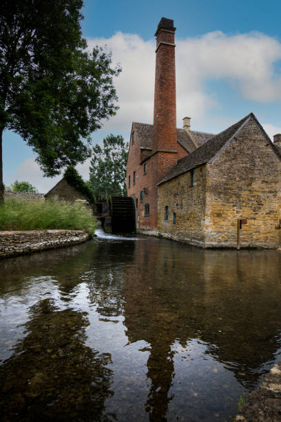 istock Water mill at Lower Slaughter in the Cotswolds 1330949522