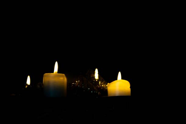 istock Candles burning in the dark. 1330950058