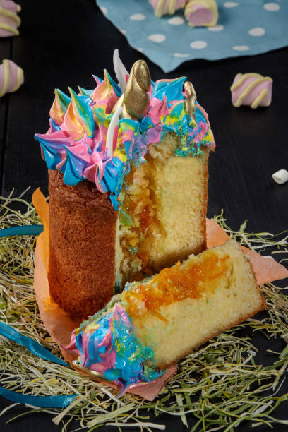 istock Sliced Easter cake with whipped egg whites in shape of unicorn 1330955459