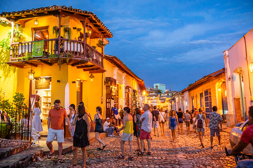 August 7, 2018 - Trinidad, Cuba: Tourists on the street in Trinidad at night, Cuba