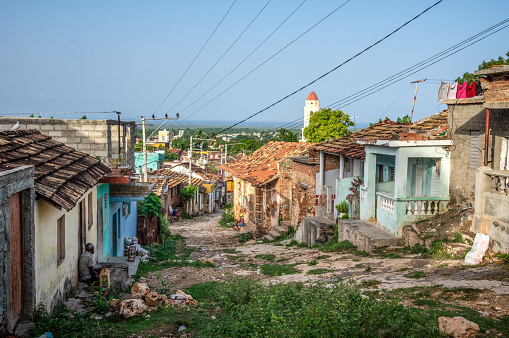 Earthquake damage in a city. Destroyed buildings after an earthquake. Collapsed buildings. Ruined city because of war. Airstrike damages a city. Urban transformation concept.