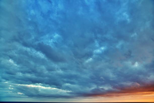 istock sun rising over the ocean 1330959938