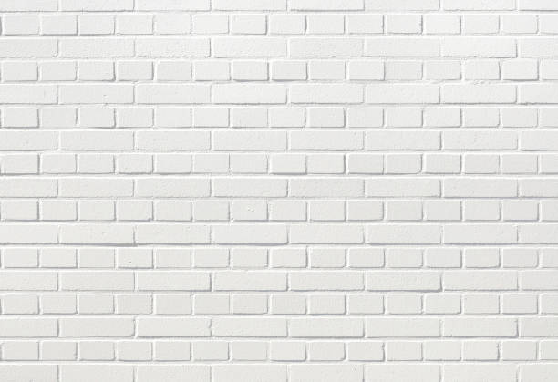 istock White brick wall. Grunge old brick room textured background for wallpaper and graphic web design. Surface of gray brick wall horizontal. Cement texture for pattern and backdrop. 1330962857