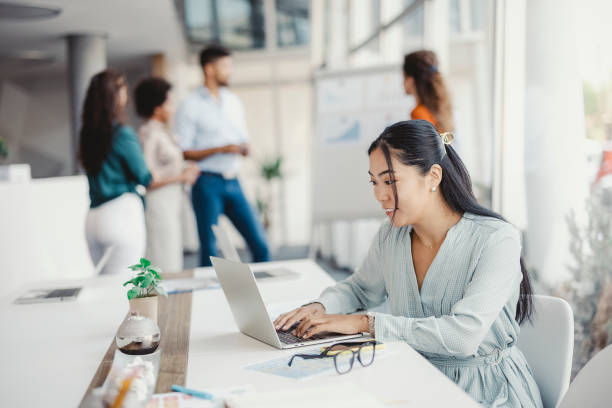 istock Asian Woman Working on Laptop 1330965068