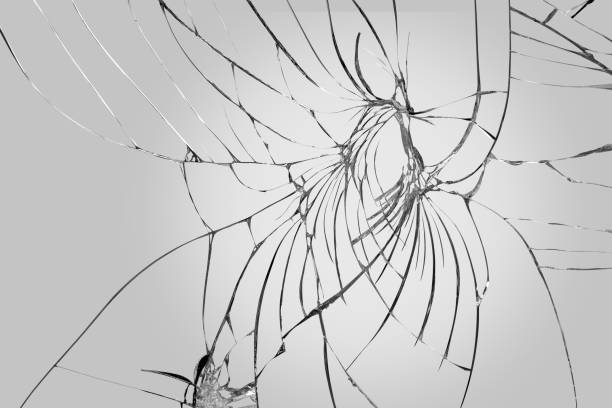 istock Close-up wrinkles and cracks clear mirror display from smash and fall bumps on white background, detail pattern and background 1330965443