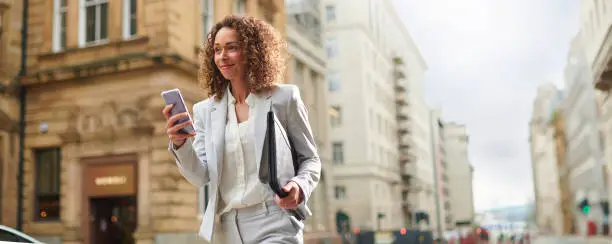 young woman relays the news by phone