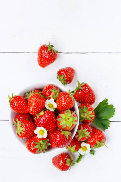 istock Strawberries berries fruits strawberry berry fruit copyspace copy space portrait format in a bowl 1330966802