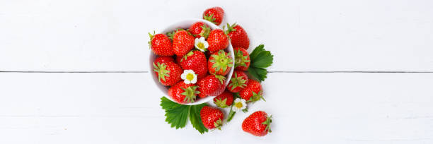 istock Strawberries berries fruits strawberry berry fruit panorama copyspace copy space in a bowl 1330967416