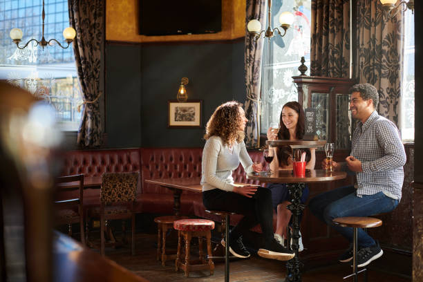 istock friends drinking in a city pub 1330967770