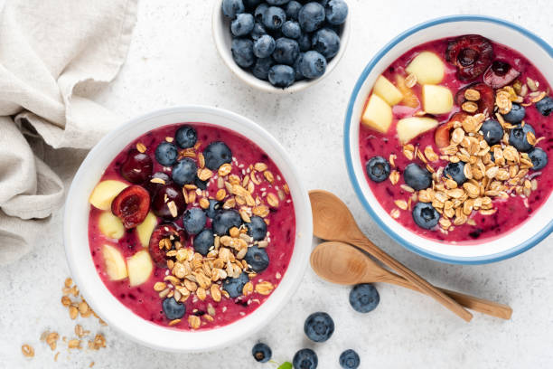 istock Vegan blueberry smoothie bowl with toppings 1330969938