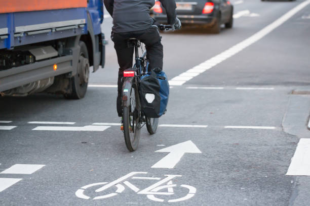 istock cyclist_truck 1330973582