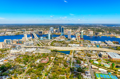 Aerial view of the beautiful city and surrounding areas of Jacksonville Florida along the St. Johns River from an altitude of about 1000 feet.