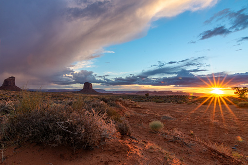 Cloudy Sunset Sunburst At Monument Valley