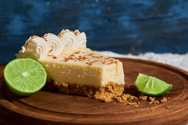 istock half-eaten slice of lemon pie on wooden board. 1330988330