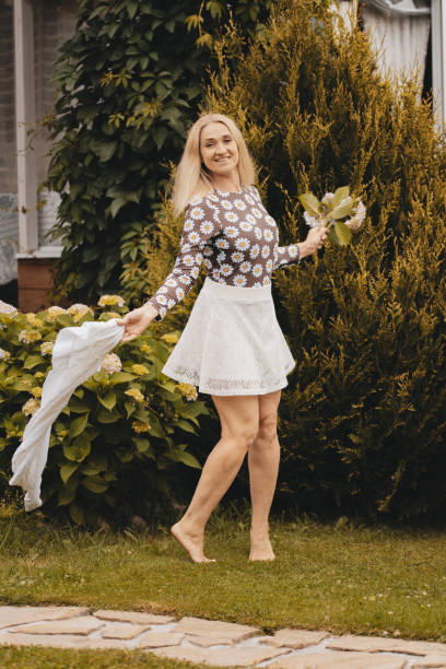 istock The girl runs on the lawn. 1330988963