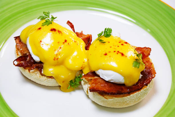 istock egg benedict on english muffin with pork or beef bacon with rich hollandaise sauce 1330996335