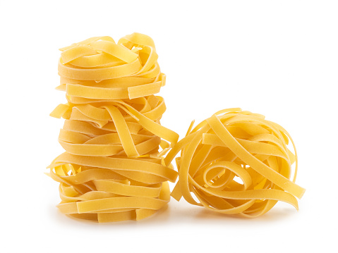 Italian fettuccine pasta isolated on white background