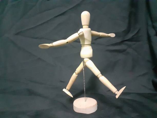 istock A wooden human toy 1331002446