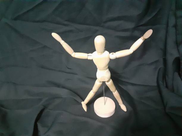 istock A wooden human toy 1331002453