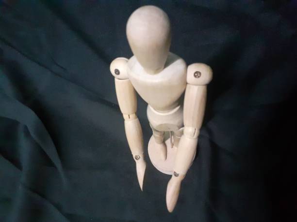 istock A wooden human toy 1331002497