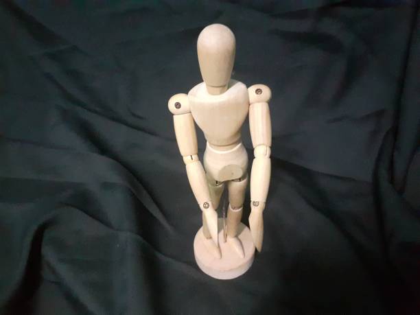 istock A wooden human toy 1331002500