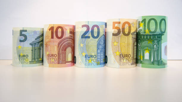 There are euro banknotes against a white background. european union economic crisis concept. stock photo