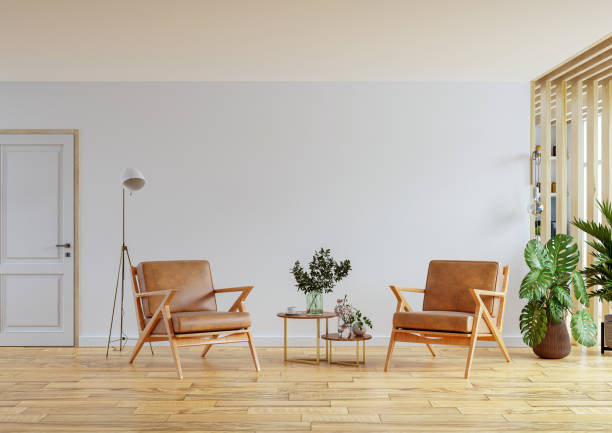 istock Leather armchair in modern apartment interior with empty wall and wooden table. 1331019255