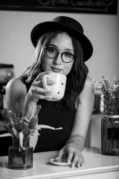 istock Young Latin woman wearing black clothes with a hat 1331019657
