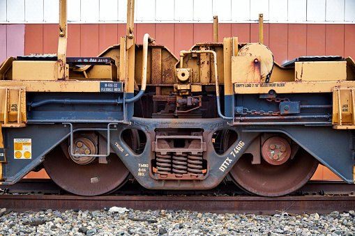 Glendale, California, USA - July 24, 2021: Train wheels on Flatcar, Glendale Station.