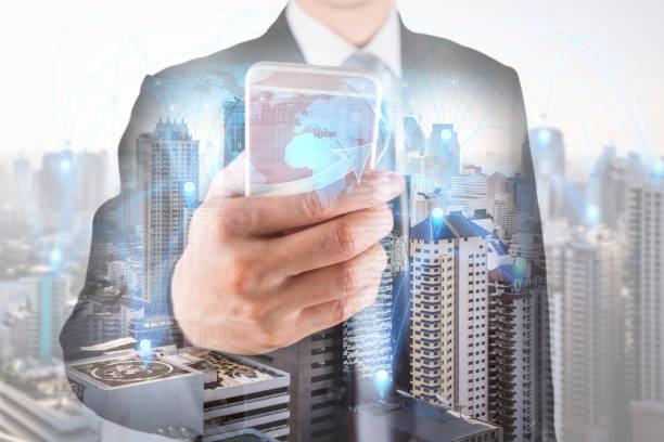 istock Double exposure of businessman use smartphone, communication 4G 5G node networking telephone cellsite and cityscape urban at foggy morning as business, technology and telecom concept 1331023498