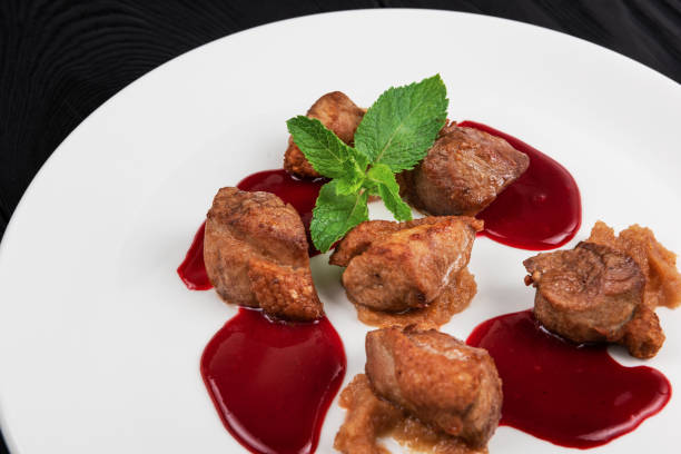istock Pork meat with berries sauce 1331024859