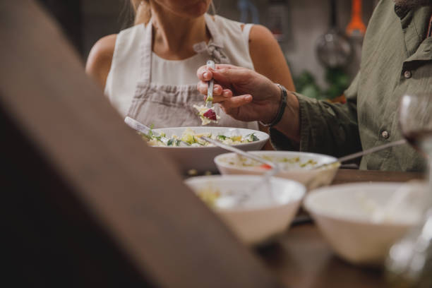 istock Unrecognizable married couple having pasta for dinner 1331029361