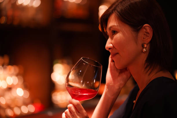 istock Woman drinking at the bar 1331029390